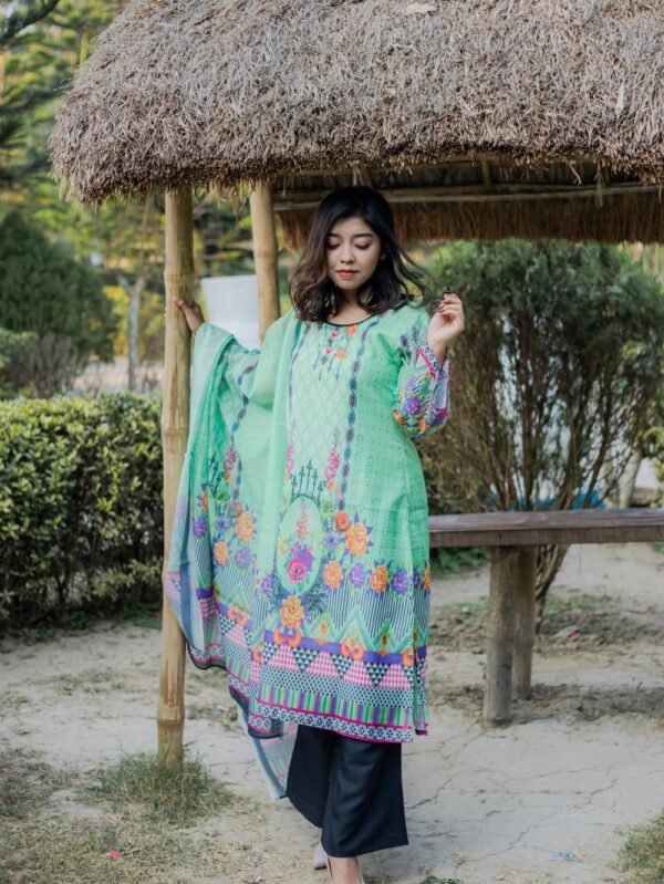 You crave something fresh and unique. This mint green digital print three piece answers your fashion dreams. The refreshing color brightens your entire look. You stand out in the most beautiful way. This printed three piece bursts with colorful floral artistry. The digital print technology creates vivid, lasting colors. You enjoy a masterpiece of modern textile design. The intricate patterns showcase exceptional craftsmanship. You will fall in love with the comfortable cotton fabric. The soft texture feels gentle against your skin. This Women's Blended Cotton Three Piece Set offers premium quality you can trust. You experience luxury at an affordable price. The kameez features a stunning central floral arrangement. You notice the artistic border details that frame the design beautifully. The matching dupatta carries the same vibrant energy. You create a cohesive, eye-catching ensemble. Looking for new model three piece options? You discovered a standout piece in our collection. This outfit represents the latest trends in Bangladeshi fashion. You stay ahead of the style curve with Leenaya. This three piece design works perfectly for spring and summer events. You stay cool while looking absolutely gorgeous. The breathable fabric allows air circulation on hot days. You maintain your elegant appearance effortlessly.
