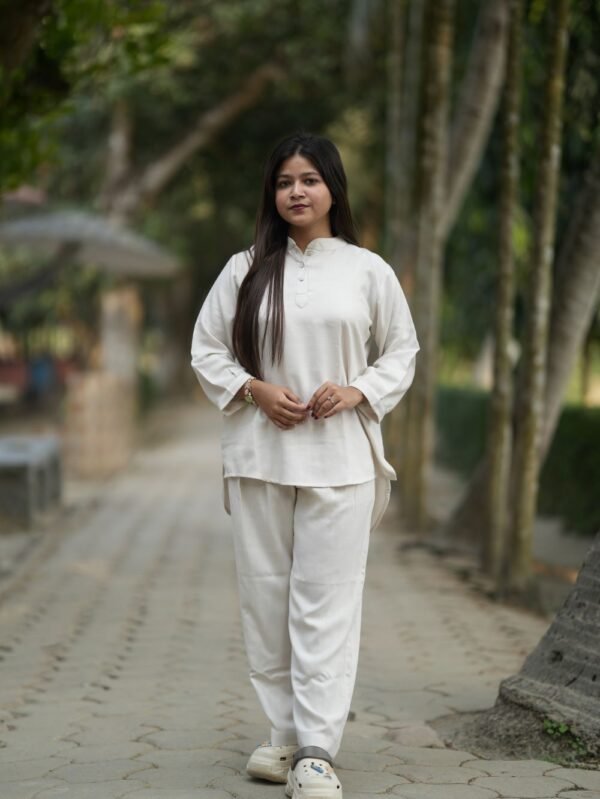 Full body view women's coord set price in Bangladesh - walking with bag off-white